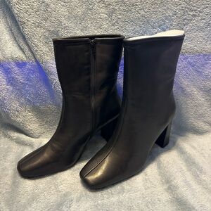 Sleek Black Heeled Boots